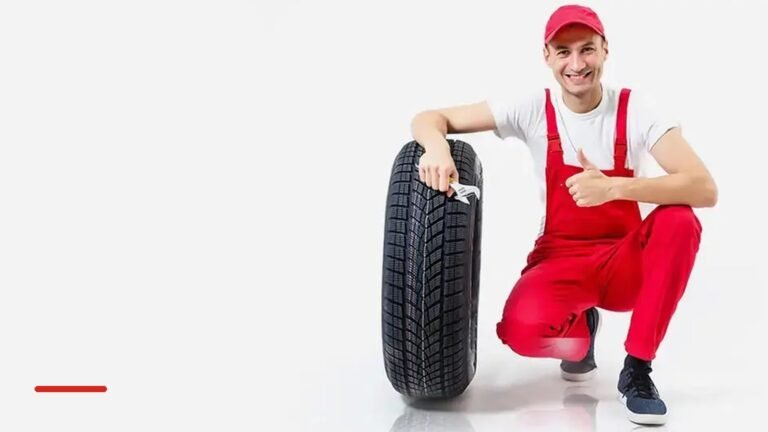 Tyre fitter with a car tyre